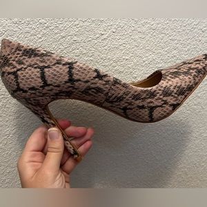 Never worn snakeskin pumps!
